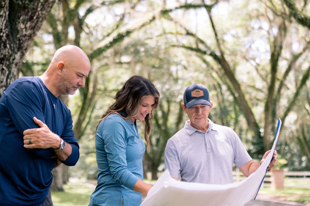 Miller's Tree Service arborist consulting with customer